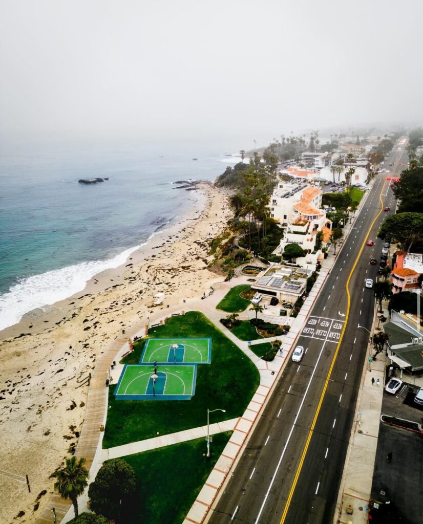 Main beach basketball courts laguna beach overhead drone shot